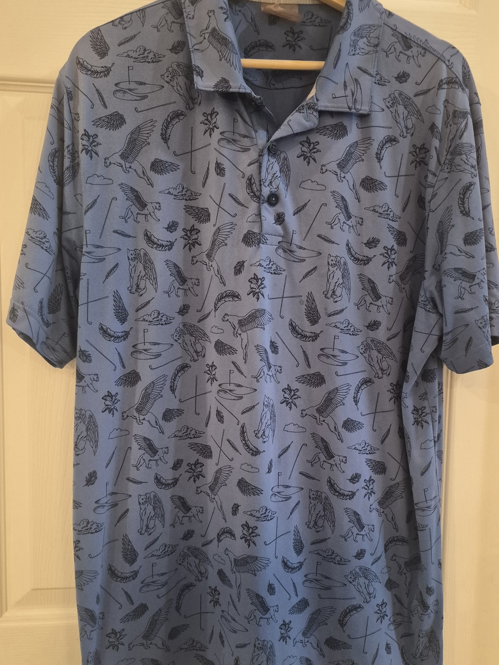 Puma Light Blue Polo with Dark Graphic Motif